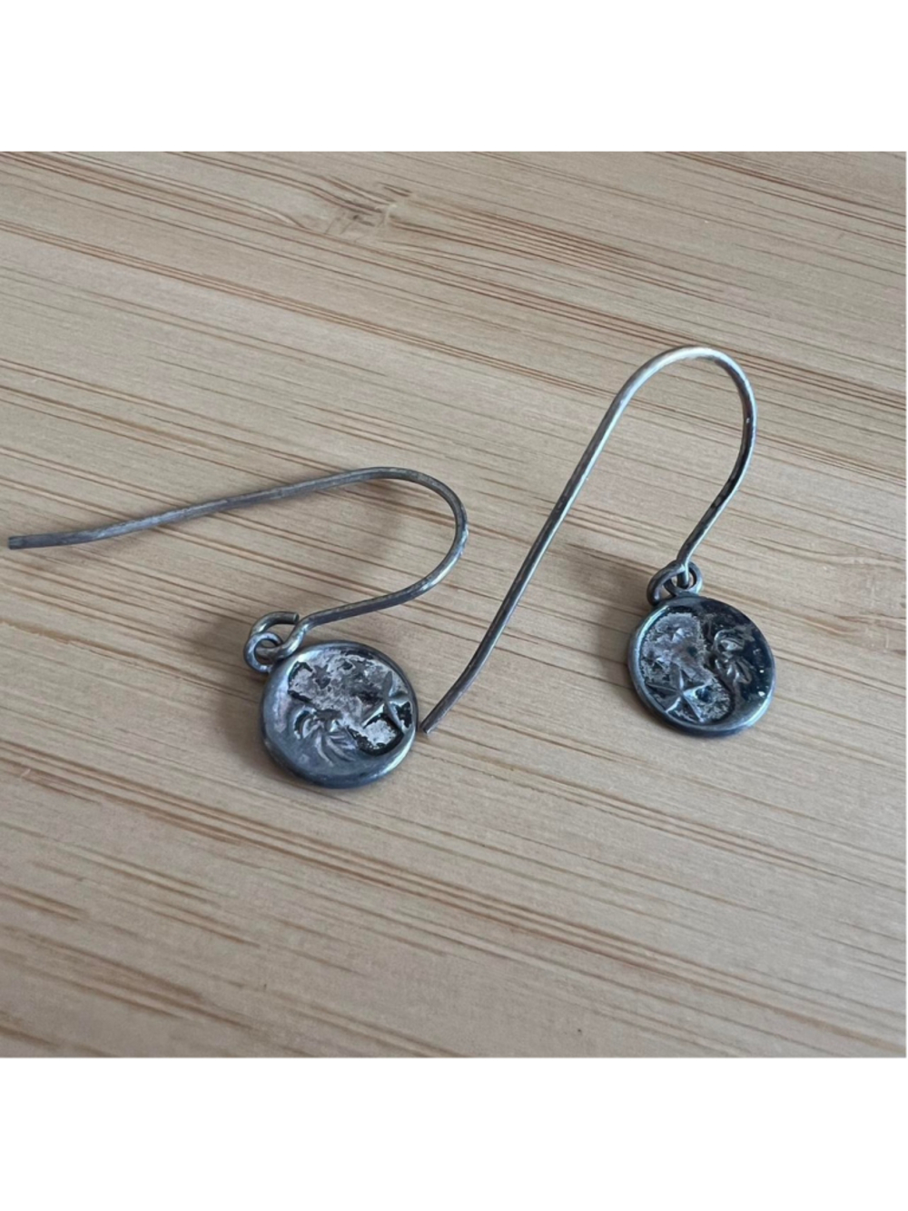Vintage silver earrings with moon and stars design